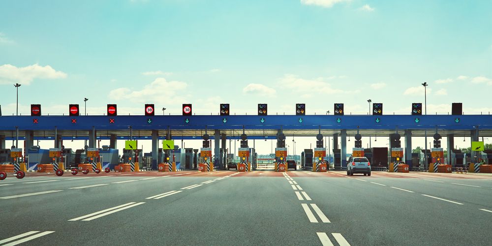 Automated highway toll plaza with FASTag and vehicle monitoring systems